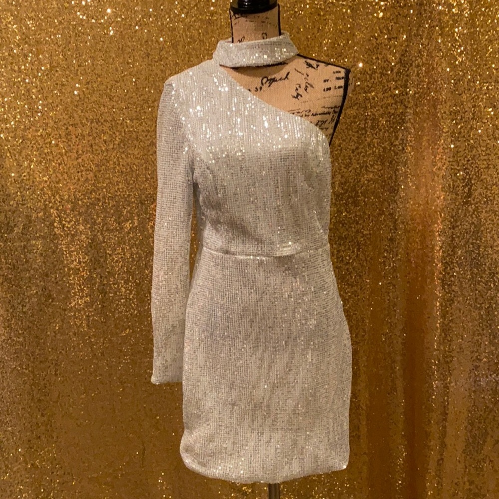 Silver sequins dress, 100% polyester.